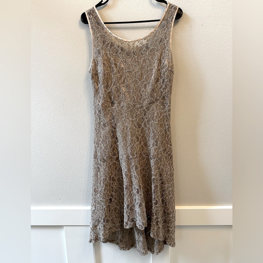 Romy gently worn champagne colored lace dress sz M.